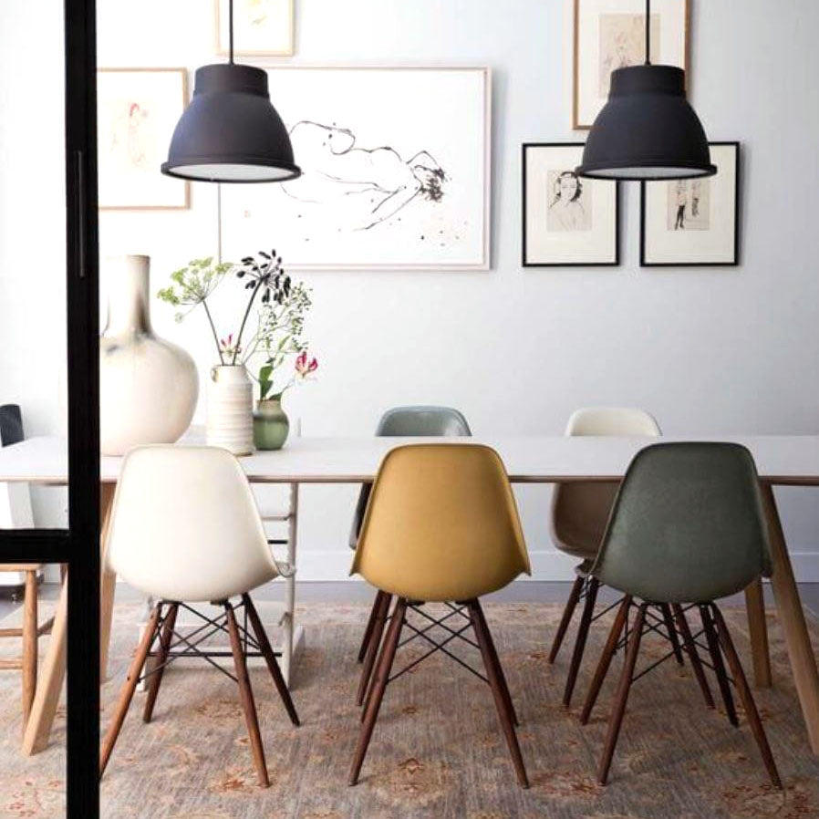 Classiques du design de Vitra et Hay dans la salle à manger